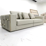 Modern Luxury Modular Leather Sofa with Grid Tufted Craftsmanship & Polished Gold Stainless Steel Accents
